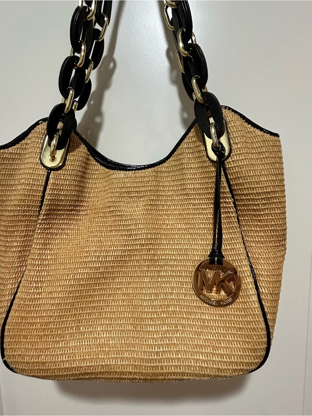 Michael Kors Straw Shoulder Purse in Tan with Black Chain handles. Nice